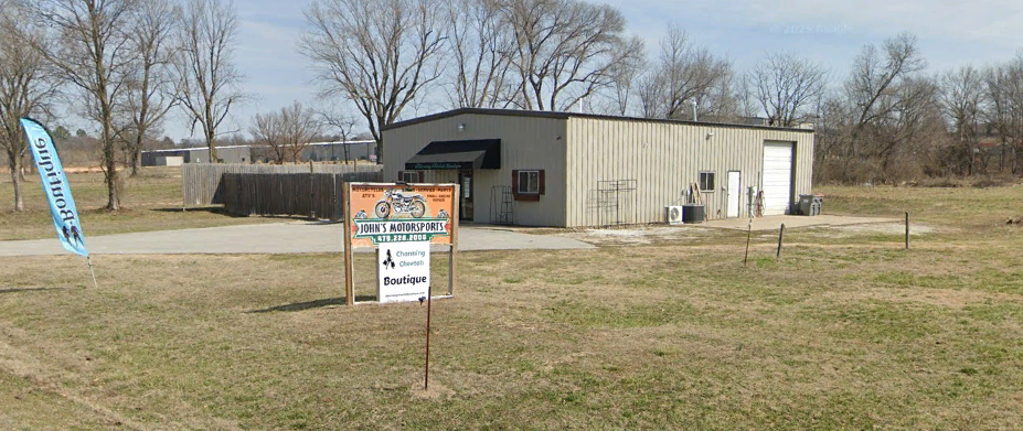 Second existing-condition view showing the building and site approach.