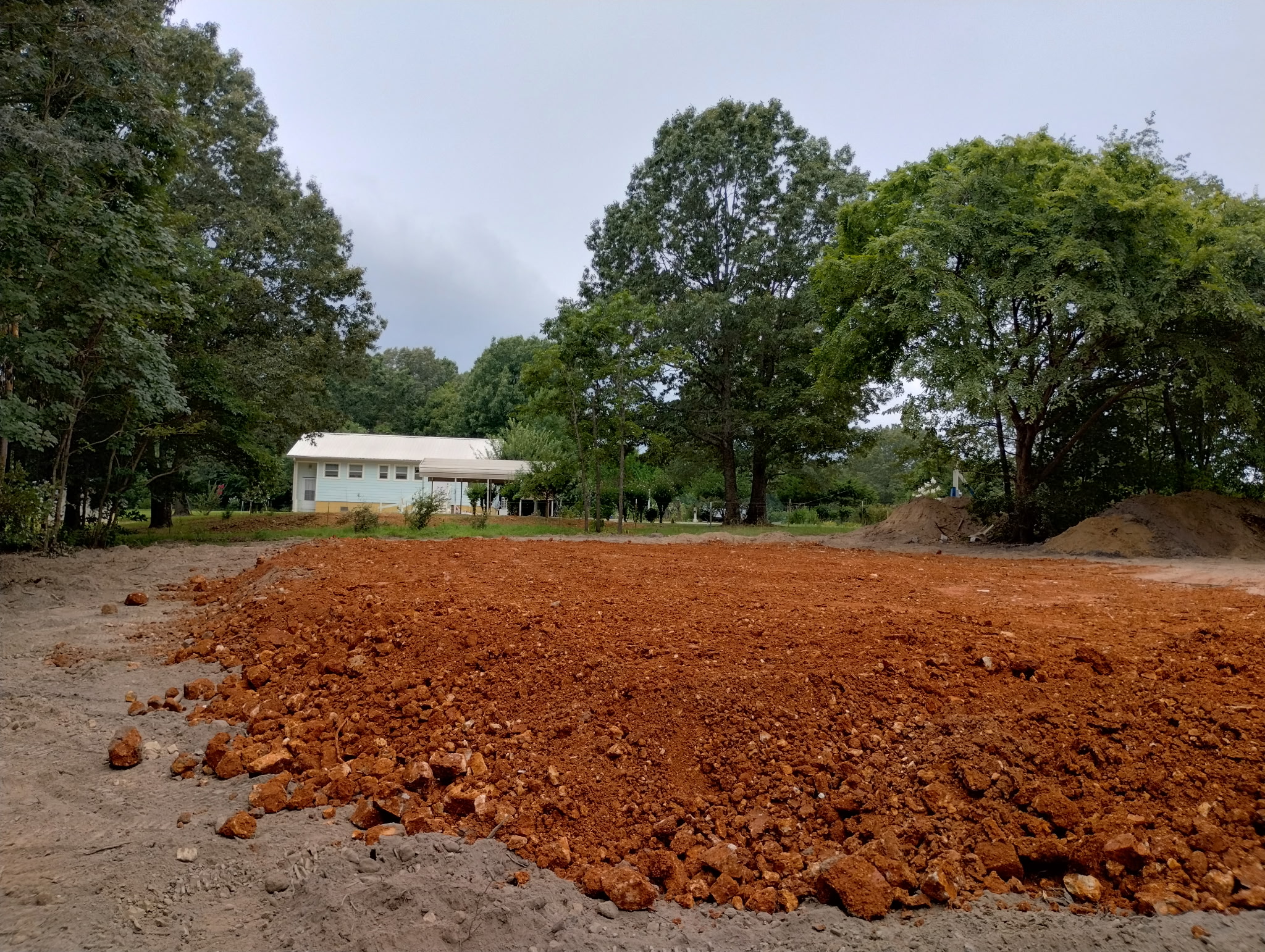 Final graded red soil surface on the Harrison site