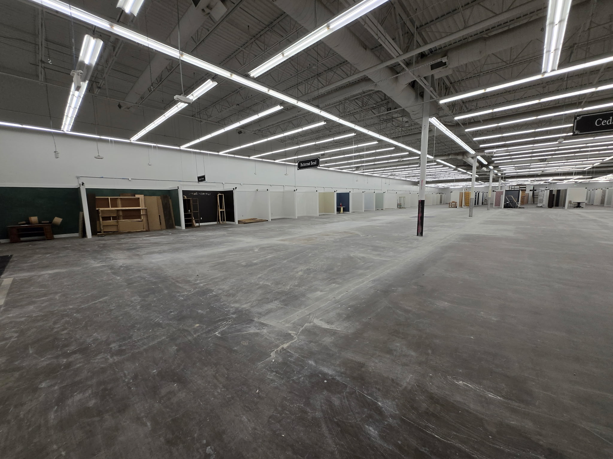Large Austin retail interior with a cleared floor and existing overhead lighting